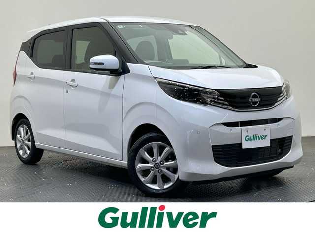 日産 デイズ X 愛媛県 2024(令6)年 0.4万km ホワイトパール ・９型ナビ（フルセグＴＶ・ＢＴ・ＦＭ・ＡＭ・ＳＤ）/・全方位カメラ　/・ＵＳＢ充電　/・前後コーナーセンサー　/・衝突軽減ブレーキ　/・スペアキー