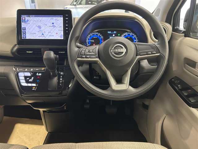 日産 デイズ X 愛媛県 2024(令6)年 0.4万km ホワイトパール ・９型ナビ（フルセグＴＶ・ＢＴ・ＦＭ・ＡＭ・ＳＤ）/・全方位カメラ　/・ＵＳＢ充電　/・前後コーナーセンサー　/・衝突軽減ブレーキ　/・スペアキー
