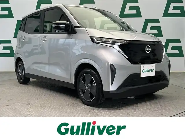 日産 サクラ X 鹿児島県 2023(令5)年 1.2万km スターリングシルバーM 純正ナビ　/フルセグＴＶ　/全方位カメラ　/前後ドラレコ　/前後コーナーセンサー　/Ｂｌｕｅｔｏｏｔｈ　/ＬＥＤヘッドライト/純正アルミ　/純正フロアマット　/プッシュスタート　/電動パーキングブレーキ　/オートホールド/インテリジェントエマージェンシーブレーキ/e-pedar/スマートキー/プッシュスタート/スペアキー/カーテンエアバッグ
