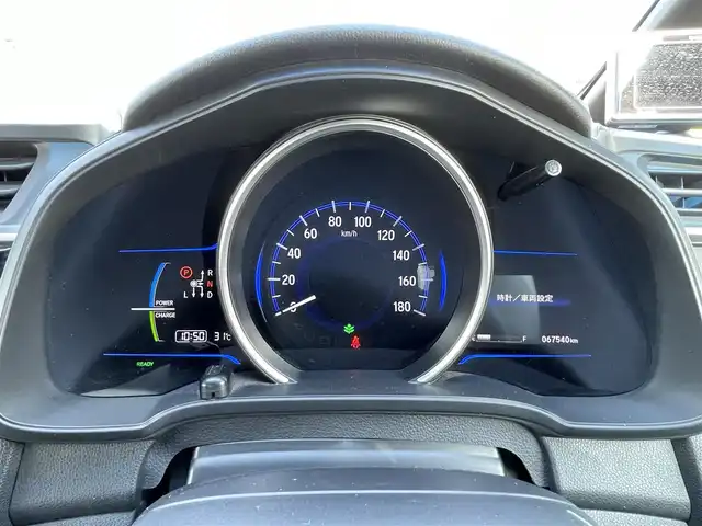 ホンダ フィット ハイブリット Sパッケージ 鳥取県 2015(平27)年 6.8万km プレミアムホワイトパールⅡ 純正8インチナビ/フルセグ/DVD/CD/BT/バックカメラ・ETC/衝突軽減ブレーキ（CTBA)/クルーズコントロール/LEDヘッドライト/フォグライト/TEIN車高調/社外17インチアルミホイール/純正エアロパーツ/リヤルーフスポイラー/プッシュエンジンスタート/アイドリングストップ/フロアマット/ドアバイザー/スペアキー