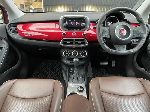フィアット ５００Ｘ ポップスタープラス 福岡県 2016(平28)年 4.9万km 赤 純正オーディオ/（FM/AM/USB/AUX）/バックカメラ/ETC/クルコン/コーナーセンサー/パドルシフト/MTモード付AT/レザーシート（茶）/パワーシート/シートヒーター（D/N席）/HIDヘッドライト/オートライト