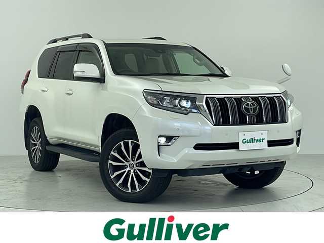 トヨタ ランドクルーザー プラド TX Lパッケージ 大阪府 2021(令3)年 5万km ホワイトパールクリスタルシャイン トヨタセーフティセンス/・プリクラッシュセーフティ/・レーンディパーチャーアラート/・レーダークルーズコントロール/・オートマチックハイビーム/・パーキングサポートブレーキ/・前後クリアランスソナー/純正7インチナビ/　　CD/DVD/BT/TV/バックカメラ/白革シート/前席パワーシート/前席シートヒーター＆シートクーラー/LEDヘッドライト/ルーフレール/純正19インチアルミホイール/純正フロアマット/純正ビルトインETC/スマートキー
