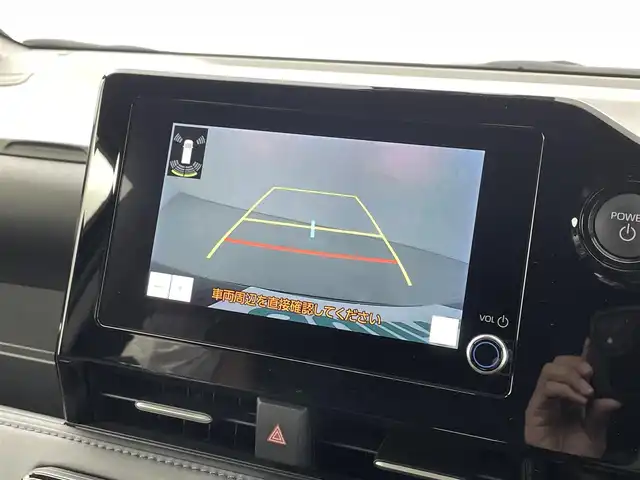 トヨタ ヴォクシー ハイブリッド S－Z 福井県 2024(令6)年 0.8万km アティチュードブラックマイカ 純正ディスプレイナビ/Bluetooth/USB/Miracast/AM/FM/バックカメラ/トヨタセーフティセンス/・プリクラッシュセーフティ/・レーントレーシングアシスト/・レーンディパーチャーアラート/・レーダークルーズコントロール/・アダプティブハイビームシステム／オートマチックハイビーム/・ロードサインアシスト：標識の見逃し防止をサポート/・ドライバー異常時対応システム/・プロアクティブドライビングアシスト/・発進遅れ告知機能/・緊急時操舵支援（アクティブ操舵機能付）/両側パワースライドドア/レーダークルーズコントロール/LEDオートライト/オートマチックハイビーム/ハーフレザーシート/シートヒーター/コーナーセンサー/スマートキー