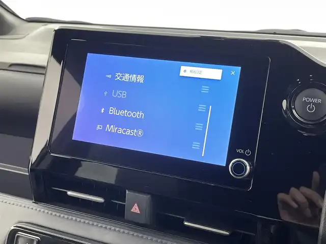 トヨタ ヴォクシー ハイブリッド S－Z 福井県 2024(令6)年 0.8万km アティチュードブラックマイカ 純正ディスプレイナビ/Bluetooth/USB/Miracast/AM/FM/バックカメラ/トヨタセーフティセンス/・プリクラッシュセーフティ/・レーントレーシングアシスト/・レーンディパーチャーアラート/・レーダークルーズコントロール/・アダプティブハイビームシステム／オートマチックハイビーム/・ロードサインアシスト：標識の見逃し防止をサポート/・ドライバー異常時対応システム/・プロアクティブドライビングアシスト/・発進遅れ告知機能/・緊急時操舵支援（アクティブ操舵機能付）/両側パワースライドドア/レーダークルーズコントロール/LEDオートライト/オートマチックハイビーム/ハーフレザーシート/シートヒーター/コーナーセンサー/スマートキー