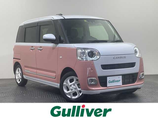ダイハツ ムーヴ キャンバス ストライプス G 愛媛県 2022(令4)年 0.9万km シャイニングホワイトパール/アプリコットピンクメタリック １０型ナビ/フルセグ／Ｂｌｕｅｔｏｏｔｈ／ＵＳＢ/全方位カメラ/前方ドライブレコーダー/ＤＮ席シートヒーター/両側パワースライドドア/前後コーナーセンサー/ＬＥＤヘッドライト/衝突軽減ブレーキ