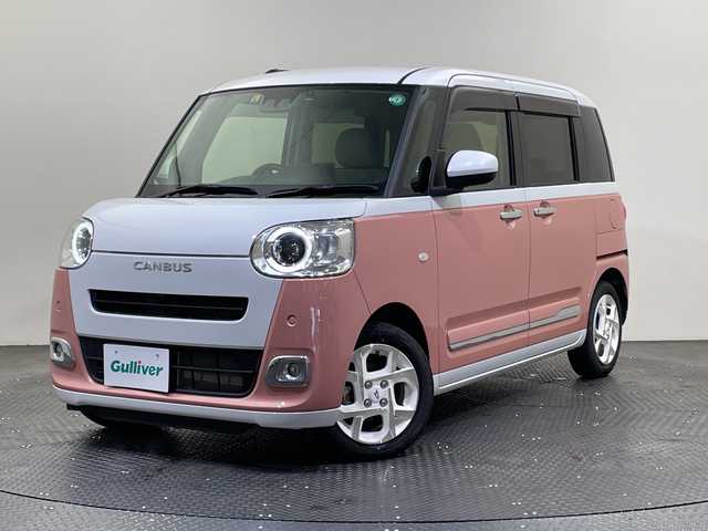 ダイハツ ムーヴ キャンバス ストライプス G 愛媛県 2022(令4)年 0.9万km シャイニングホワイトパール/アプリコットピンクメタリック １０型ナビ/フルセグ／Ｂｌｕｅｔｏｏｔｈ／ＵＳＢ/全方位カメラ/前方ドライブレコーダー/ＤＮ席シートヒーター/両側パワースライドドア/前後コーナーセンサー/ＬＥＤヘッドライト/衝突軽減ブレーキ