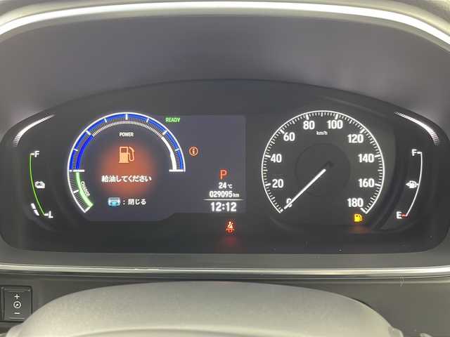 ホンダ オデッセイ ハイブリッド e:HEVアブソルート EX 岐阜県 2021(令3)年 2.9万km プラチナホワイトパール 純正１０インチプレミアムインターナビ/CD/DVD/Bluetooth/SD/USB/フルセグTV/Honda SENSING/・衝突軽減ブレーキ/・誤発進抑制機能/・後方誤発進抑制機能/・歩行者事故低減ステアリング/・路外逸脱抑制機能/・渋滞追従機能付アダプティブクルーズコントロール/・車線維持支援システム/・先行車発進お知らせ機能/・標識認識機能/LEDアクティブコーナリングライト/オートブレーキホールド機能/エマージェンシーストップシグナル/後方出庫サポート/ブラインドスポットインフォメーション/ハンズフリーアクセスパワーテールゲート/運転席＋助手席シートーヒーター/トリプルゾーンコントロール・フルオートエアコン/100V・AC電源/マルチビューカメラシステム/パーキングセンサーシステム/両側パワースライドドア/ETC2.0