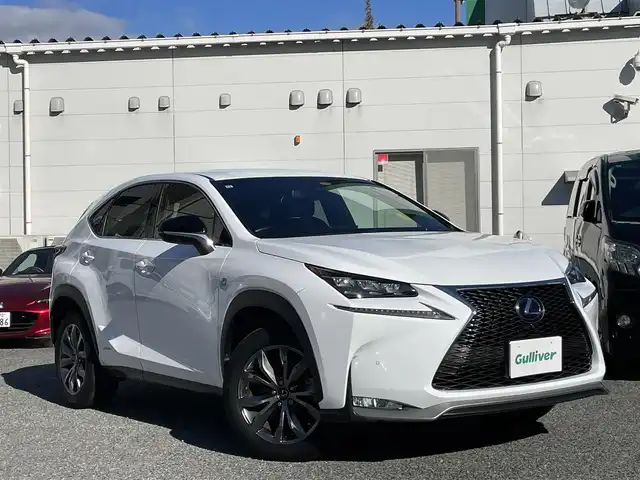 レクサス ＮＸ 300h Fスポーツ 兵庫県 2015(平27)年 3.9万km ホワイトノーヴァガラスフレーク /OP レーダークルーズコントロール//OP パノラミックビューモニター//OP BSM//OP クリアランスソナー//OP プリクラッシュセーフティ//OP レーンディパーチャーアラート（LDA）//OP スペアタイヤ//OP 3眼フルLEDヘッドランプ//OP オートマチックハイビーム//OP パワーバックドア//OP AC100V電源/・メーカーSDナビ/・地デジ/DVD/BT/USB/AUX/・ステアリングリモコン/・ステアリングヒーター/・Fスポーツ専用シート（電動/ヒーター/ベンチレーション）//運転席メモリー付/・パドルシフト/・ビルトインETC/・純正18インチAW/・カードキー