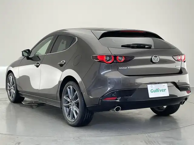 マツダ マツダ３ファストバック 20S バーガンディセレクション 愛知県 2019(令1)年 5.8万km チタニウムフラッシュマイカ 純正８．８型ディスプレイオーディオ　フルセグＴＶ　ＨＤＭＩ　アラウンドビューモニター　赤革　レーダークルコン　シートヒーター　ステアリングヒーター　ドラレコ　ＢＳＭ　ＨＵＤ　ＬＥＤオートライト　禁煙車
