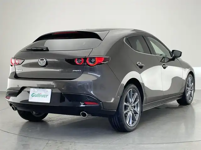 マツダ マツダ３ファストバック 20S バーガンディセレクション 愛知県 2019(令1)年 5.8万km チタニウムフラッシュマイカ 純正８．８型ディスプレイオーディオ　フルセグＴＶ　ＨＤＭＩ　アラウンドビューモニター　赤革　レーダークルコン　シートヒーター　ステアリングヒーター　ドラレコ　ＢＳＭ　ＨＵＤ　ＬＥＤオートライト　禁煙車