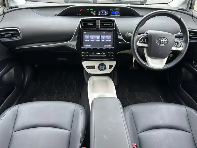 トヨタ プリウス A ツーリングセレクション 静岡県 2016(平28)年 4.5万km ホワイトパールクリスタルシャイン モデリスタエアロ/（フロント・サイド・リア）/純正9インチSDナビ/（AM/FM/BT/CD）/フルセグTV/バックカメラ/ヘッドアップディスプレイ/レーダークルーズコントロール/レザーシート/前席シートヒーター/ブラインドスポットモニター/前方ドライブレコーダー/横滑り防止装置/レーンキープアシスト/盗難防止装置/衝突被害軽減システム/前後コーナーセンサー/ビルトインETC/プッシュスタート/スマートキー/LEDヘッドライト/オートマチックハイビーム/純正17インチアルミホイール/純正フロアマット/保証書/取扱説明書