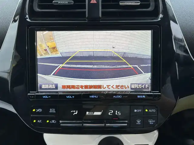 トヨタ プリウス A ツーリングセレクション 静岡県 2016(平28)年 4.5万km ホワイトパールクリスタルシャイン モデリスタエアロ/（フロント・サイド・リア）/純正9インチSDナビ/（AM/FM/BT/CD）/フルセグTV/バックカメラ/ヘッドアップディスプレイ/レーダークルーズコントロール/レザーシート/前席シートヒーター/ブラインドスポットモニター/前方ドライブレコーダー/横滑り防止装置/レーンキープアシスト/盗難防止装置/衝突被害軽減システム/前後コーナーセンサー/ビルトインETC/プッシュスタート/スマートキー/LEDヘッドライト/オートマチックハイビーム/純正17インチアルミホイール/純正フロアマット/保証書/取扱説明書