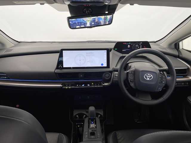 トヨタ プリウス Z 愛知県 2023(令5)年 2.9万km プラチナホワイトパールマイカ 衝突軽減システム/純正12.3型ディズプレイオーディオ　ナビ機能なし/全方位カメラ/ガラスルーフ/レーダークルーズコントロール/シートヒーター/エアシート/フルセグ/Bluetooth/バックカメラ/電動リアゲート/パワーシート/コーナーセンサー/純正アルミホイール/ETC2.0/ブラインドスポットモニター/LEDヘッドライト/ステアリングヒーター/インテリジェントミラー/オートマチックハイビーム/置くだけ充電機/ステアリングスイッチ/スマートキー/プッシュスタート