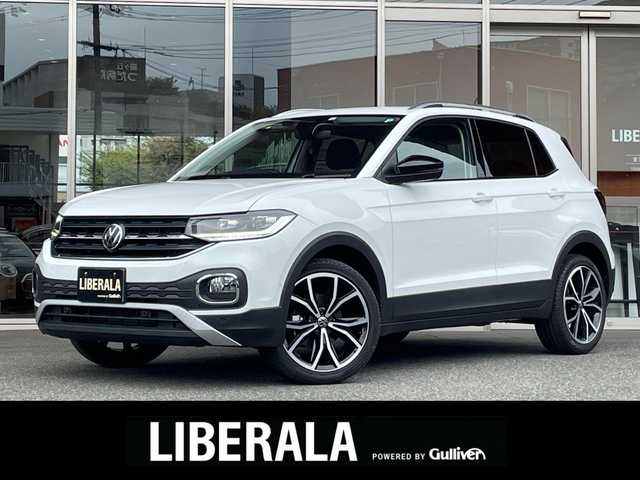 フォルクスワーゲン ＶＷ Ｔ－クロス TSI スタイル 福岡県 2022(令4)年 2.1万km ピュアホワイト セーフティＰＫＧ　/テクロノジーＰＫＧ　/デザインＰＫＧ　/ＤｉｓｃｏｖｅｒＰｒｏＰＫＧ　/デジタルメータークラスター　/ＡＣＣ／ＢＳＭ　/純正ナビ　　/Ｂカメラ　/Ｂｌｕｅｔｏｏｔｈ　/ＯＰ純正１８インチＡＷ