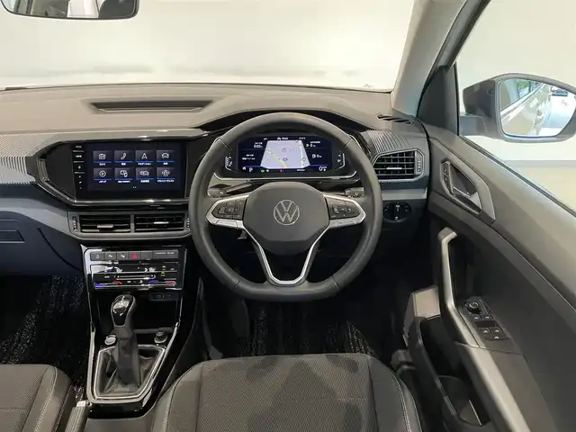 フォルクスワーゲン ＶＷ Ｔ－クロス TSI スタイル 福岡県 2022(令4)年 2.1万km ピュアホワイト セーフティＰＫＧ　/テクロノジーＰＫＧ　/デザインＰＫＧ　/ＤｉｓｃｏｖｅｒＰｒｏＰＫＧ　/デジタルメータークラスター　/ＡＣＣ／ＢＳＭ　/純正ナビ　　/Ｂカメラ　/Ｂｌｕｅｔｏｏｔｈ　/ＯＰ純正１８インチＡＷ