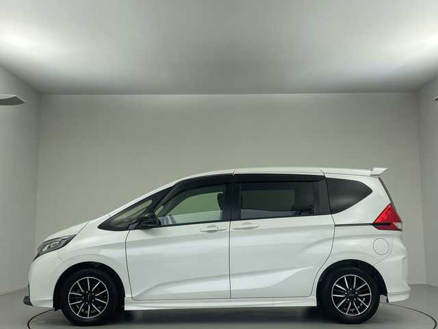 ホンダ フリード モデューロX ホンダセンシング 大阪府 2018(平30)年 5.2万km ホワイトオーキッドパール 純正９型ナビ　フルセグＴＶ　前後ドライブレコーダー　ビルトインＥＴＣ　バックカメラ　両側パワースライドドア　ＬＥＤヘッドライト　フォグランプ　純正１５インチＡＷ　純正フロアマット　スマートキー　禁煙車