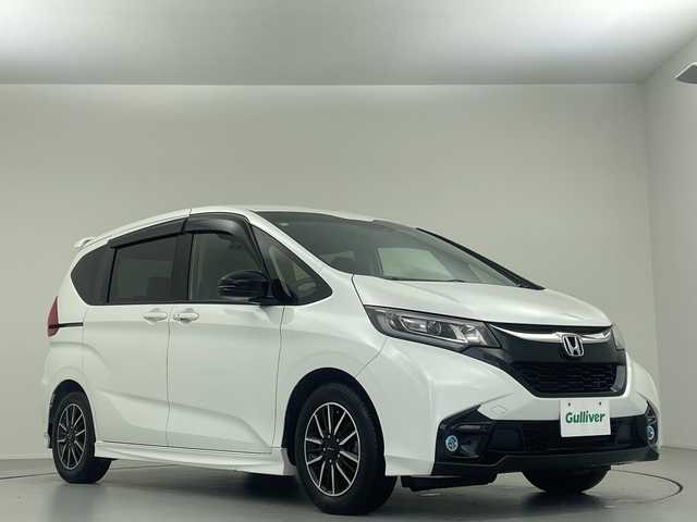 ホンダ フリード モデューロX ホンダセンシング 大阪府 2018(平30)年 5.2万km ホワイトオーキッドパール 純正９型ナビ　フルセグＴＶ　前後ドライブレコーダー　ビルトインＥＴＣ　バックカメラ　両側パワースライドドア　ＬＥＤヘッドライト　フォグランプ　純正１５インチＡＷ　純正フロアマット　スマートキー　禁煙車