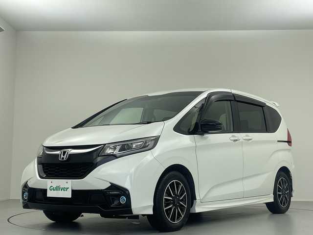 ホンダ フリード モデューロX ホンダセンシング 大阪府 2018(平30)年 5.2万km ホワイトオーキッドパール 純正９型ナビ　フルセグＴＶ　前後ドライブレコーダー　ビルトインＥＴＣ　バックカメラ　両側パワースライドドア　ＬＥＤヘッドライト　フォグランプ　純正１５インチＡＷ　純正フロアマット　スマートキー　禁煙車