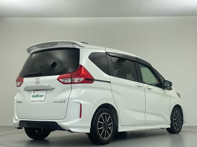 ホンダ フリード モデューロX ホンダセンシング 大阪府 2018(平30)年 5.2万km ホワイトオーキッドパール 純正９型ナビ　フルセグＴＶ　前後ドライブレコーダー　ビルトインＥＴＣ　バックカメラ　両側パワースライドドア　ＬＥＤヘッドライト　フォグランプ　純正１５インチＡＷ　純正フロアマット　スマートキー　禁煙車