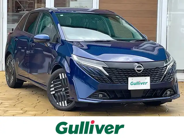 日産 オーラ G レザーエディション 宮崎県 2024(令6)年 0.1万km オーロラフレアブルーパール メモリナビ/フルセグテレビ/バックカメラ/クルーズコントロール/プッシュスタート/ETC2.0/インテリジェントルームミラー/プロパイロット/アラウンドビューモニター/BOSEサウンドシステム/シートヒーター/ステアリングヒーター/純正17インチアルミ