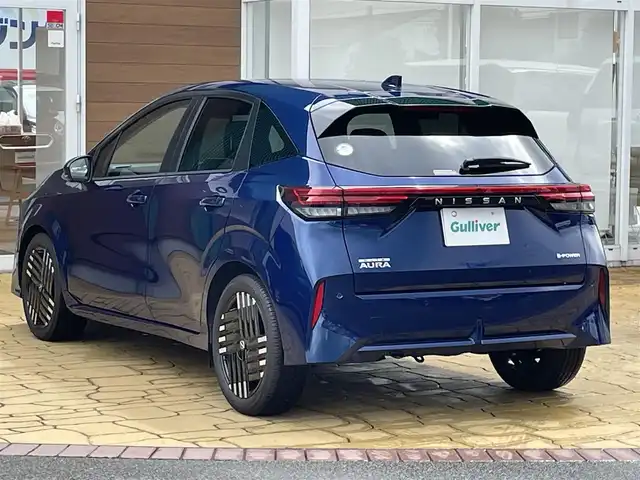 日産 オーラ G レザーエディション 宮崎県 2024(令6)年 0.1万km オーロラフレアブルーパール メモリナビ/フルセグテレビ/バックカメラ/クルーズコントロール/プッシュスタート/ETC2.0/インテリジェントルームミラー/プロパイロット/アラウンドビューモニター/BOSEサウンドシステム/シートヒーター/ステアリングヒーター/純正17インチアルミ