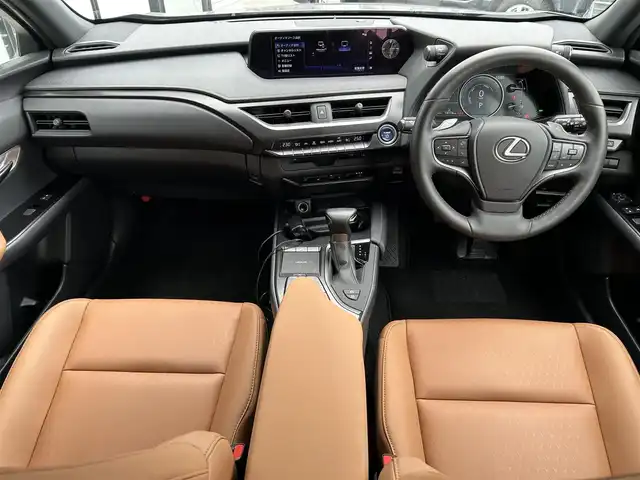 レクサス ＵＸ 250h バージョンC 宮城県 2021(令3)年 1.5万km マーキュリーグレーマイカ セーフティシステムプラス/・プリクラッシュセーフティ/・レーントレーシングアシスト/・オートマチックハイビーム/・レーダークルーズコントロール/・先行車発進告知機能/・ロードサインアシスト/メーカーナビ/サウンドライブラリー【SD・BT・AUX】/3眼LED/ブラウンレザー（合皮）シート/センターディスプレー/リモートタッチ/ドライブモードセレクター/デュアルエアコン/ステリングヒーター/D・N席パワーシート・シートヒーター/シートメモリー/パドルシフト/登録時走行距離14174km