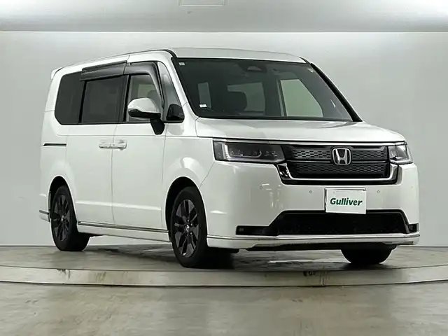 ホンダ ステップワゴン スパーダ eHEV 愛知県 2023(令5)年 3万km プラチナホワイトパール 禁煙車/ワンオーナー/純正１１.4インチホンダコネクトナビ/（ＤＶＤ/ＣＤ/フルセグTV/Bluetooth/ＡＭ/ＦＭ）/バックカメラ/ホンダセンシング/・ブラインドスポットモニター/・レーンキープアシスト/・オートハイビーム/・衝突軽減ブレーキ/・レーダークルーズコントロール/・クリアランスソナー/アドバンスドルームミラー/ＥＴＣ/前後ドライブレコーダー/シートヒーター/オットマン/両側パワースライドドア/パワーバックドア/プッシュスタート/スマートキー/ＬＥＤヘッドライト/オートライト/フロントフォグランプ/純正フロアマット/純正16インチアルミホイール/横滑り防止装置