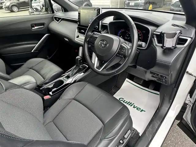 トヨタ カローラ クロス ハイブリッド Z 群馬県 2023(令5)年 1.5万km パール ナビゲーション　/フルセグテレビ　/ブルートゥース　/ＵＳＢ　/ＥＴＣ　　/全方位カメラ　/アダプティブクルーズ　/車線逸脱警報　/衝突軽減ブレーキ　/ブラインドスポットモニタ/革シート　/パワーバックドア　/保証書　/取扱説明書　/整備手帳/スマートキーX２個