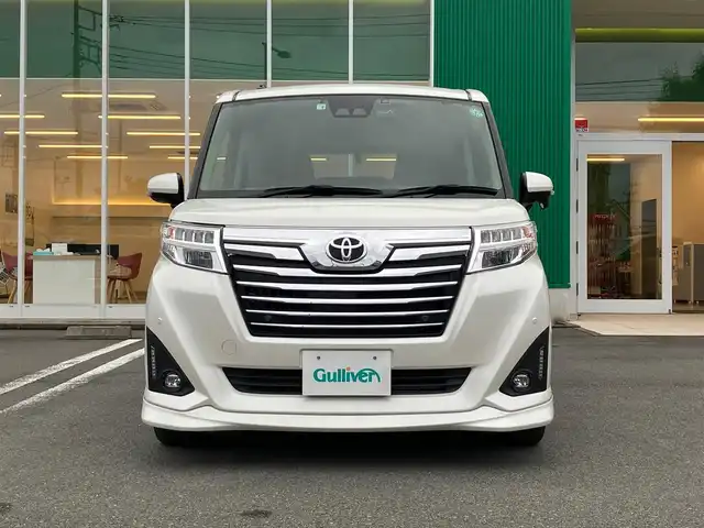 トヨタ ルーミー カスタムG－T 静岡県 2020(令2)年 4.3万km パールホワイトⅢ エンジンスタートボタン/パワーステアリング/パワーウィンドウ/アイドリングストップ/スマートキー/スペアキー１本/オートエアコン/クルーズコントロール/ETC2.0/バックカメラ/純正9インチナビ（CD.BT.フルセグ）/ドライブレコーダー/ウォークスルー/純正フロアマット/純正アルミホイール/D席N席シートヒーター/両側パワースライドドア/ABS/横滑り防止装置/コーナーセンサー前後/オートライト/オートマチックハイビーム/LEDライト/Wエアバック/衝突軽減システム