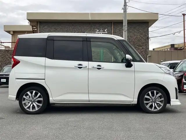 トヨタ ルーミー カスタムG－T 静岡県 2020(令2)年 4.3万km パールホワイトⅢ エンジンスタートボタン/パワーステアリング/パワーウィンドウ/アイドリングストップ/スマートキー/スペアキー１本/オートエアコン/クルーズコントロール/ETC2.0/バックカメラ/純正9インチナビ（CD.BT.フルセグ）/ドライブレコーダー/ウォークスルー/純正フロアマット/純正アルミホイール/D席N席シートヒーター/両側パワースライドドア/ABS/横滑り防止装置/コーナーセンサー前後/オートライト/オートマチックハイビーム/LEDライト/Wエアバック/衝突軽減システム