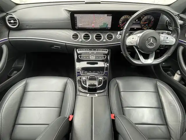 メルセデス・ベンツ Ｅ２００ アバンギャルド AMGライン 福岡県 2019(令1)年 7.4万km ダイヤモンドホワイト パノラミックスライディングルーフ/レザーエクスクルーシブパッケージ/・黒色レザーシート/・メモリー付きパワーシート(D/N)/・電動ランバーサポート(D/N)/・シートヒーター(全席)/純正12.3インチディスプレイオーディオ/　(AM/FM/Bluetooth/ナビ)/バック/サイド/フロント/360度カメラ/安全運転支援システム/・ブレーキアシスト/・ディスタンスアシストディストロニック/・ステアリングアシスト/・パーキングアシスト/・ブラインドスポットアシスト/・レーンキーピングアシスト/・横滑り防止/オートライト/純正19インチアルミホイール/パワートランクリッド/Burmesterサウンド/アンビエントライト/ヘッドアップディスプレイ/パドルシフト/ステアリングスイッチ/純正前後ドライブレコーダー/ETC/ISOFIX/スペアキー×1/保証書/取扱説明書