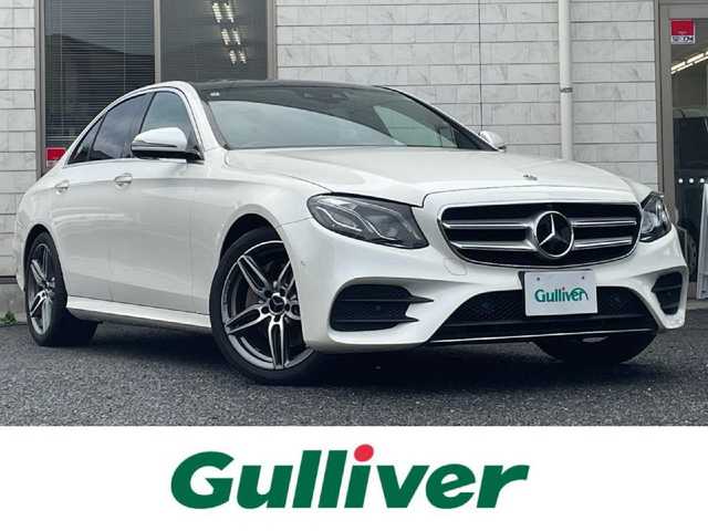 メルセデス・ベンツ Ｅ２００ アバンギャルド AMGライン 福岡県 2019(令1)年 7.4万km ダイヤモンドホワイト パノラミックスライディングルーフ/レザーエクスクルーシブパッケージ/・黒色レザーシート/・メモリー付きパワーシート(D/N)/・電動ランバーサポート(D/N)/・シートヒーター(全席)/純正12.3インチディスプレイオーディオ/　(AM/FM/Bluetooth/ナビ)/バック/サイド/フロント/360度カメラ/安全運転支援システム/・ブレーキアシスト/・ディスタンスアシストディストロニック/・ステアリングアシスト/・パーキングアシスト/・ブラインドスポットアシスト/・レーンキーピングアシスト/・横滑り防止/オートライト/純正19インチアルミホイール/パワートランクリッド/Burmesterサウンド/アンビエントライト/ヘッドアップディスプレイ/パドルシフト/ステアリングスイッチ/純正前後ドライブレコーダー/ETC/ISOFIX/スペアキー×1/保証書/取扱説明書