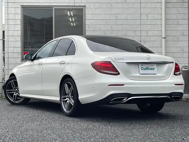 メルセデス・ベンツ Ｅ２００ アバンギャルド AMGライン 福岡県 2019(令1)年 7.4万km ダイヤモンドホワイト パノラミックスライディングルーフ/レザーエクスクルーシブパッケージ/・黒色レザーシート/・メモリー付きパワーシート(D/N)/・電動ランバーサポート(D/N)/・シートヒーター(全席)/純正12.3インチディスプレイオーディオ/　(AM/FM/Bluetooth/ナビ)/バック/サイド/フロント/360度カメラ/安全運転支援システム/・ブレーキアシスト/・ディスタンスアシストディストロニック/・ステアリングアシスト/・パーキングアシスト/・ブラインドスポットアシスト/・レーンキーピングアシスト/・横滑り防止/オートライト/純正19インチアルミホイール/パワートランクリッド/Burmesterサウンド/アンビエントライト/ヘッドアップディスプレイ/パドルシフト/ステアリングスイッチ/純正前後ドライブレコーダー/ETC/ISOFIX/スペアキー×1/保証書/取扱説明書