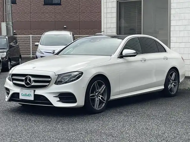 メルセデス・ベンツ Ｅ２００ アバンギャルド AMGライン 福岡県 2019(令1)年 7.4万km ダイヤモンドホワイト パノラミックスライディングルーフ/レザーエクスクルーシブパッケージ/・黒色レザーシート/・メモリー付きパワーシート(D/N)/・電動ランバーサポート(D/N)/・シートヒーター(全席)/純正12.3インチディスプレイオーディオ/　(AM/FM/Bluetooth/ナビ)/バック/サイド/フロント/360度カメラ/安全運転支援システム/・ブレーキアシスト/・ディスタンスアシストディストロニック/・ステアリングアシスト/・パーキングアシスト/・ブラインドスポットアシスト/・レーンキーピングアシスト/・横滑り防止/オートライト/純正19インチアルミホイール/パワートランクリッド/Burmesterサウンド/アンビエントライト/ヘッドアップディスプレイ/パドルシフト/ステアリングスイッチ/純正前後ドライブレコーダー/ETC/ISOFIX/スペアキー×1/保証書/取扱説明書