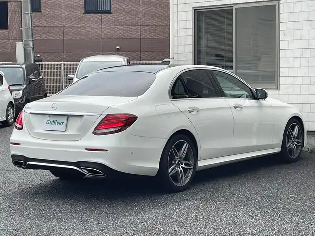 メルセデス・ベンツ Ｅ２００ アバンギャルド AMGライン 福岡県 2019(令1)年 7.4万km ダイヤモンドホワイト パノラミックスライディングルーフ/レザーエクスクルーシブパッケージ/・黒色レザーシート/・メモリー付きパワーシート(D/N)/・電動ランバーサポート(D/N)/・シートヒーター(全席)/純正12.3インチディスプレイオーディオ/　(AM/FM/Bluetooth/ナビ)/バック/サイド/フロント/360度カメラ/安全運転支援システム/・ブレーキアシスト/・ディスタンスアシストディストロニック/・ステアリングアシスト/・パーキングアシスト/・ブラインドスポットアシスト/・レーンキーピングアシスト/・横滑り防止/オートライト/純正19インチアルミホイール/パワートランクリッド/Burmesterサウンド/アンビエントライト/ヘッドアップディスプレイ/パドルシフト/ステアリングスイッチ/純正前後ドライブレコーダー/ETC/ISOFIX/スペアキー×1/保証書/取扱説明書