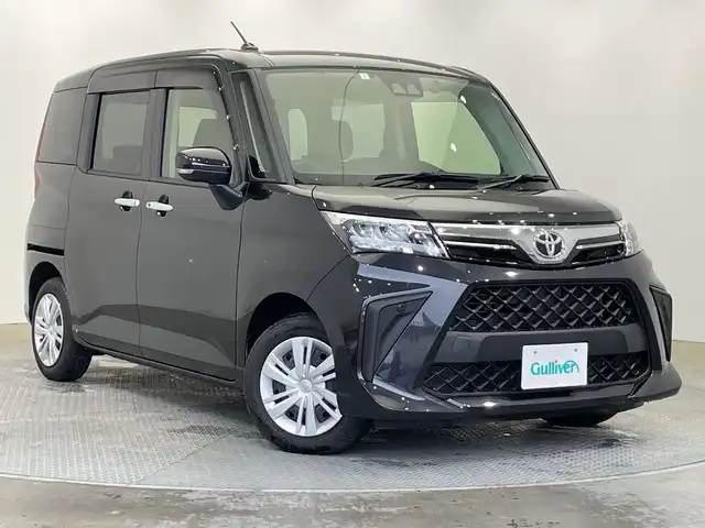 トヨタ ルーミー G 栃木県 2023(令5)年 1.2万km ブラックマイカメタリック 純正ナビ/（CD/DVD/フルセグTV/Bluetooth/SD/AUX/USB）/バックカメラ/前後コーナーセンサー/ビルトインETC/両側パワースライドドア/シートヒーター/禁煙車/オートライト/LEDヘッドライト/横滑り防止装置/スマートキー/プッシュスタート/アイドリングストップ/ステアリングスイッチ/電動格納ミラー/社外フロアマット