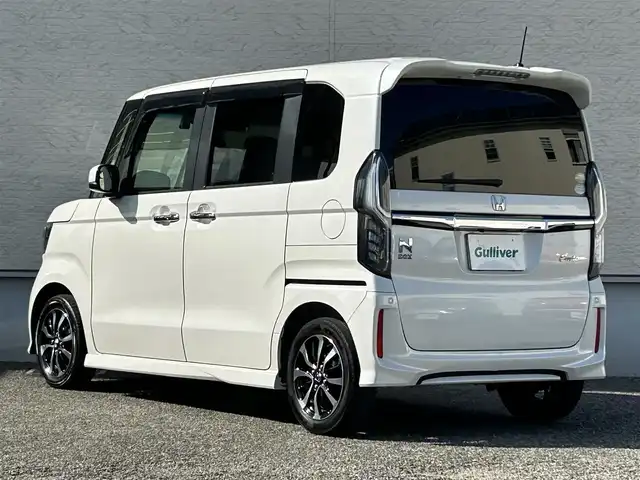 ホンダ Ｎ ＢＯＸ カスタム G L ホンダセンシング 大阪府 2020(令2)年 7万km プラチナホワイトパール ワンオーナー/純正メモリナビ（VXM-204UFi）/BT/CD/DVD/フルセグTV/バックカメラ/前席シートヒーター/片側パワースライドドア/カーテンエアバック/コーナーセンサー/レーンキープアシスト/LEDヘッドライト/後席ロールサンシェード/USB充電ポート/純正フロアマット/スペアキー/ドライブレコーダー/ETC