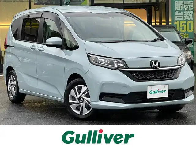ホンダ フリード ハイブリット G 島根県 2024(令6)年 1.2万km フィヨルドミストパール ホンダセンシング /純正9インチナビ/CD/DVD/DTV/Bluetooth/USB/レーダークルーズコントロール/両側パワースライドドア/LEDオートライト/シートヒーター /ビルトインETC/前後ドライブレコーダー/ステアリングスイッチ/レーンキープ/フロントワイパーデアイサー /スマートキー/スペアキー /プッシュスタート /純正フロアマット/ドアバイザー