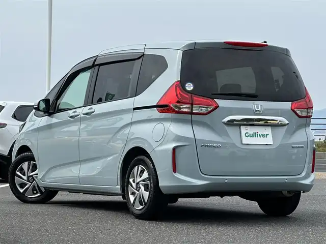 ホンダ フリード ハイブリット G 島根県 2024(令6)年 1.2万km フィヨルドミストパール ホンダセンシング /純正9インチナビ/CD/DVD/DTV/Bluetooth/USB/レーダークルーズコントロール/両側パワースライドドア/LEDオートライト/シートヒーター /ビルトインETC/前後ドライブレコーダー/ステアリングスイッチ/レーンキープ/フロントワイパーデアイサー /スマートキー/スペアキー /プッシュスタート /純正フロアマット/ドアバイザー