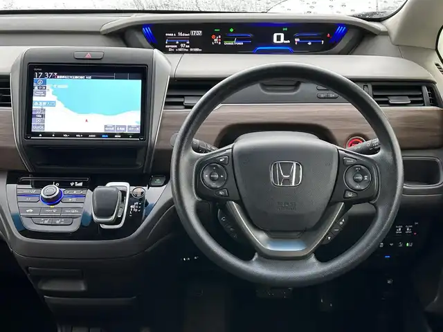 ホンダ フリード ハイブリット G 島根県 2024(令6)年 1.2万km フィヨルドミストパール ホンダセンシング /純正9インチナビ/CD/DVD/DTV/Bluetooth/USB/レーダークルーズコントロール/両側パワースライドドア/LEDオートライト/シートヒーター /ビルトインETC/前後ドライブレコーダー/ステアリングスイッチ/レーンキープ/フロントワイパーデアイサー /スマートキー/スペアキー /プッシュスタート /純正フロアマット/ドアバイザー