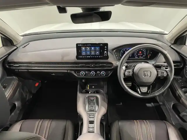 ホンダ ＺＲ－Ｖ ハイブリッド e:HEV Z 愛知県 2023(令5)年 2.6万km プラチナホワイトパール Ｈｏｎｄａ　ＣＯＮＮＥＣＴディスプレー/・ナビ　BT USB DTV AM FM/ホンダセンシング/アダプティブクルーズコントロール/衝突軽減ブレーキ/マルチビューカメラシステム/アダプティブドライビングビーム/路外逸脱抑制機能/ＢＯＳＥサウンド/パワーバックドア(予約クローズ機能付)/前席シートヒーター/ビルトインＥＴＣ２．０/ワイヤレス充電器/前後ドライブレコーダー/ブラウンレザーシート/前席パワーシート/パドルシフト/MT付きAT/ＬＥＤヘットライト/オートライト/純正18インチアルミ/プッシュエンジンスタート