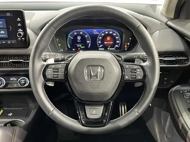 ホンダ ＺＲ－Ｖ ハイブリッド e:HEV Z 愛知県 2023(令5)年 2.6万km プラチナホワイトパール Ｈｏｎｄａ　ＣＯＮＮＥＣＴディスプレー/・ナビ　BT USB DTV AM FM/ホンダセンシング/アダプティブクルーズコントロール/衝突軽減ブレーキ/マルチビューカメラシステム/アダプティブドライビングビーム/路外逸脱抑制機能/ＢＯＳＥサウンド/パワーバックドア(予約クローズ機能付)/前席シートヒーター/ビルトインＥＴＣ２．０/ワイヤレス充電器/前後ドライブレコーダー/ブラウンレザーシート/前席パワーシート/パドルシフト/MT付きAT/ＬＥＤヘットライト/オートライト/純正18インチアルミ/プッシュエンジンスタート