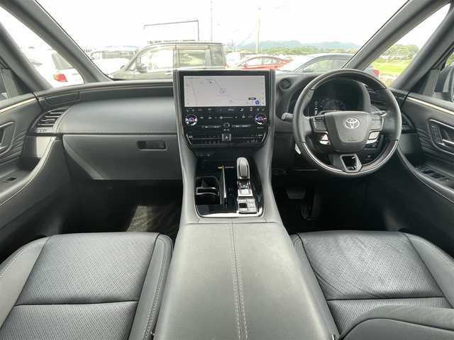 トヨタ ヴェルファイア ハイブリット Z プレミア 佐賀県 2024(令6)年 1.9万km ブラック ワンオーナー/左右独立ムーンルーフ/黒革シート/純正14インチディスプレイオーディオ(ナビ機能付)/13.2型フリップダウンモニター/パノラミックビューモニター/ビルトインETC2.0/デジタルインナーミラー/ヘッドアップディスプレイ/アドバンストパーク/両側パワースライドドア/100V電源/パワーバックドア(予約ロック機能付)/電子パーキングブレーキ/・AUTO HOLD機能/置くだけ充電/DN席＋2列目パワーシート/シートヒーター/シートベンチレーション(D席メモリー機能付)/2列目電動オットマン/後席用電動サイドサンシェード/パドルシフト/革巻きステアリング/ステアリングヒーター/リモコン/純正19インチアルミホイール/純正三眼LEDヘッドライト/・アダプティブハイビームシステム/純正LEDフォグランプ/純正ドアバイザ―/新車保証書/スペアキー１本/トヨタセーフティセンス/・レーダークルーズコントロール/・プリクラッシュセーフティ/・プロアクティブドライビングアシスト/・フロント/リヤクロストラフィックアラート/・クリアランスソナー他