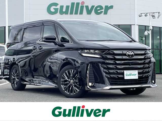 トヨタ ヴェルファイア ハイブリット Z プレミア 佐賀県 2024(令6)年 1.9万km ブラック ワンオーナー/左右独立ムーンルーフ/黒革シート/純正14インチディスプレイオーディオ(ナビ機能付)/13.2型フリップダウンモニター/パノラミックビューモニター/ビルトインETC2.0/デジタルインナーミラー/ヘッドアップディスプレイ/アドバンストパーク/両側パワースライドドア/100V電源/パワーバックドア(予約ロック機能付)/電子パーキングブレーキ/・AUTO HOLD機能/置くだけ充電/DN席＋2列目パワーシート/シートヒーター/シートベンチレーション(D席メモリー機能付)/2列目電動オットマン/後席用電動サイドサンシェード/パドルシフト/革巻きステアリング/ステアリングヒーター/リモコン/純正19インチアルミホイール/純正三眼LEDヘッドライト/・アダプティブハイビームシステム/純正LEDフォグランプ/純正ドアバイザ―/新車保証書/スペアキー１本/トヨタセーフティセンス/・レーダークルーズコントロール/・プリクラッシュセーフティ/・プロアクティブドライビングアシスト/・フロント/リヤクロストラフィックアラート/・クリアランスソナー他