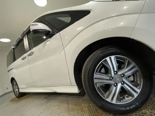 ホンダ ステップワゴン スパーダ eHEV G EXホンダS 愛知県 2020(令2)年 2.5万km プラチナホワイトパール 純正１０インチナビ　/(Bluetooth/フルセグTV/CD・DVD再生/SD/FM/AM)/純正フリップダウンモニター　/ＤＩＡＴＯＮＥサウンド　/ホンダセンシング　/　　-衝突軽減ブレーキ/　　-誤発進抑制機能/　　-路外逸脱抑制機能/　　-アダプティブ・クルーズ・コントロール/　　-車線維持支援システム/　　-先行車発進お知らせ機能/　　-標識認識機能/　　-両側パワースライドドア　/シートヒーター　/ビルトインＥＴＣ２．０　/バックカメラ/前後ドライブレコーダー　/ＬＥＤヘッドライト/LEDフォグランプ/ＵＳＢ接続/プッシュスタート/　　スマートキー/純正フロアマット