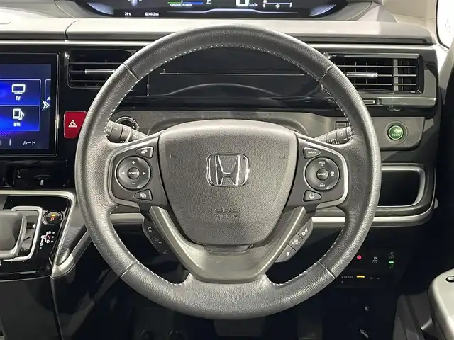 ホンダ ステップワゴン スパーダ eHEV G EXホンダS 愛知県 2020(令2)年 2.5万km プラチナホワイトパール 純正１０インチナビ　/(Bluetooth/フルセグTV/CD・DVD再生/SD/FM/AM)/純正フリップダウンモニター　/ＤＩＡＴＯＮＥサウンド　/ホンダセンシング　/　　-衝突軽減ブレーキ/　　-誤発進抑制機能/　　-路外逸脱抑制機能/　　-アダプティブ・クルーズ・コントロール/　　-車線維持支援システム/　　-先行車発進お知らせ機能/　　-標識認識機能/　　-両側パワースライドドア　/シートヒーター　/ビルトインＥＴＣ２．０　/バックカメラ/前後ドライブレコーダー　/ＬＥＤヘッドライト/LEDフォグランプ/ＵＳＢ接続/プッシュスタート/　　スマートキー/純正フロアマット