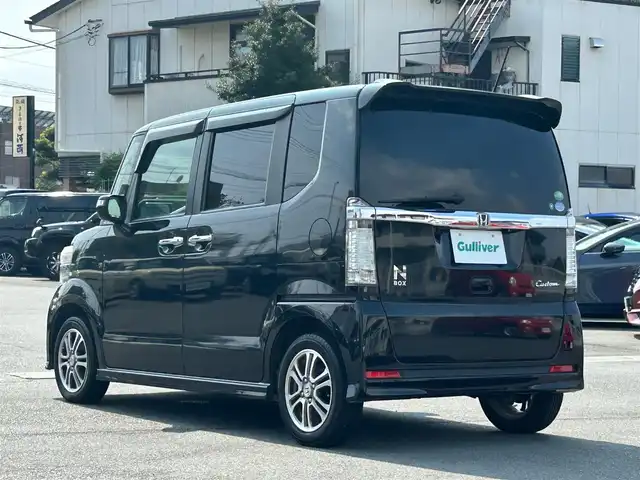 ホンダ Ｎ ＢＯＸ カスタム SSパッケージ 静岡県 2014(平26)年 6.8万km スマートブラック エンジンスタート/パワーステアリング/パワーウィンドウ/アイドリングストップ/AAC/スマートキー（スペアキー：1本）/バックカメラ/ETC/純正SDナビ（フルセグTV、DVD再生機能有、CDチェンジャー）/ベンチシート/純正フロアマット/布系シート/両側パワースライドドア/純正アルミホイール/ABS/横滑り防止装置/オートライト/キセノンヘッドライト/W＋サイドエアバッグ/カーテンエアバッグ/衝突軽減システム