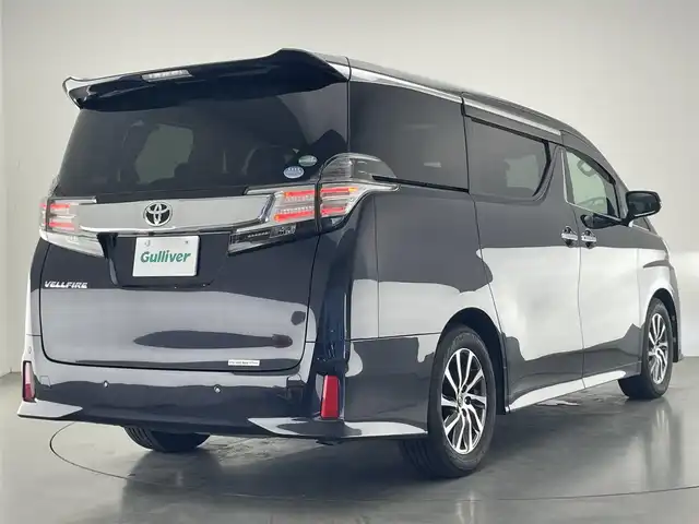 トヨタ ヴェルファイア Z Aエディション 愛知県 2016(平28)年 10.1万km スパークリングブラックパールクリスタルシャイン 社外９型ナビ　１０型後席モニター　禁煙車　ＡＣ１００Ｖ　フルセグＴＶ　ＤＶＤ　Ｂｌｕｅｔｏｏｔｈ　オットマン　両側パワスラ　ＥＴＣ　前後ドラレコ　バックカメラ　追従クルコン　ＬＥＤオートライト　フォグ　衝突軽減 コーナーセンサー USB　スマートキー 純正フロアマット 純正17インチAW　スペアタイヤ
