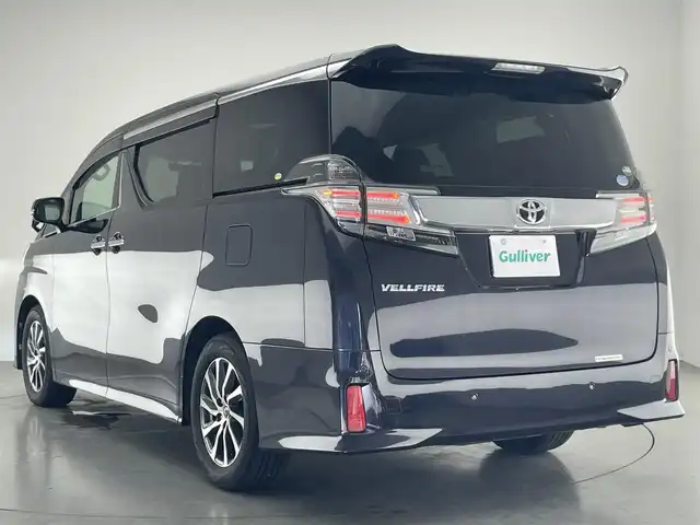 トヨタ ヴェルファイア Z Aエディション 愛知県 2016(平28)年 10.1万km スパークリングブラックパールクリスタルシャイン 社外９型ナビ　１０型後席モニター　禁煙車　ＡＣ１００Ｖ　フルセグＴＶ　ＤＶＤ　Ｂｌｕｅｔｏｏｔｈ　オットマン　両側パワスラ　ＥＴＣ　前後ドラレコ　バックカメラ　追従クルコン　ＬＥＤオートライト　フォグ　衝突軽減 コーナーセンサー USB　スマートキー 純正フロアマット 純正17インチAW　スペアタイヤ