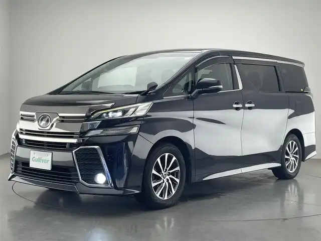 トヨタ ヴェルファイア Z Aエディション 愛知県 2016(平28)年 10.1万km スパークリングブラックパールクリスタルシャイン 社外９型ナビ　１０型後席モニター　禁煙車　ＡＣ１００Ｖ　フルセグＴＶ　ＤＶＤ　Ｂｌｕｅｔｏｏｔｈ　オットマン　両側パワスラ　ＥＴＣ　前後ドラレコ　バックカメラ　追従クルコン　ＬＥＤオートライト　フォグ　衝突軽減 コーナーセンサー USB　スマートキー 純正フロアマット 純正17インチAW　スペアタイヤ